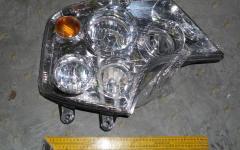 Фара передняя левая HOWO A7 WG9925720001