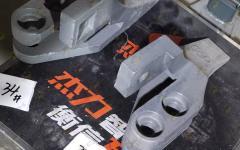 Зуб боковой левый переднего ковша Shanmon 388H Z110010800